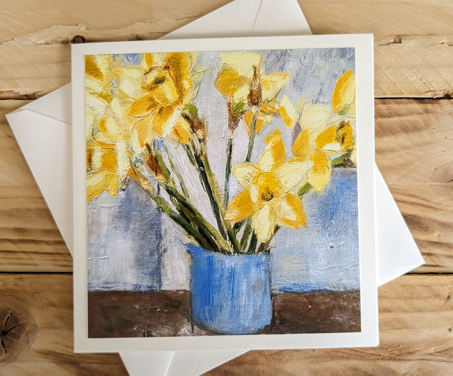 Daffodils in Blue Ceramic Pot
